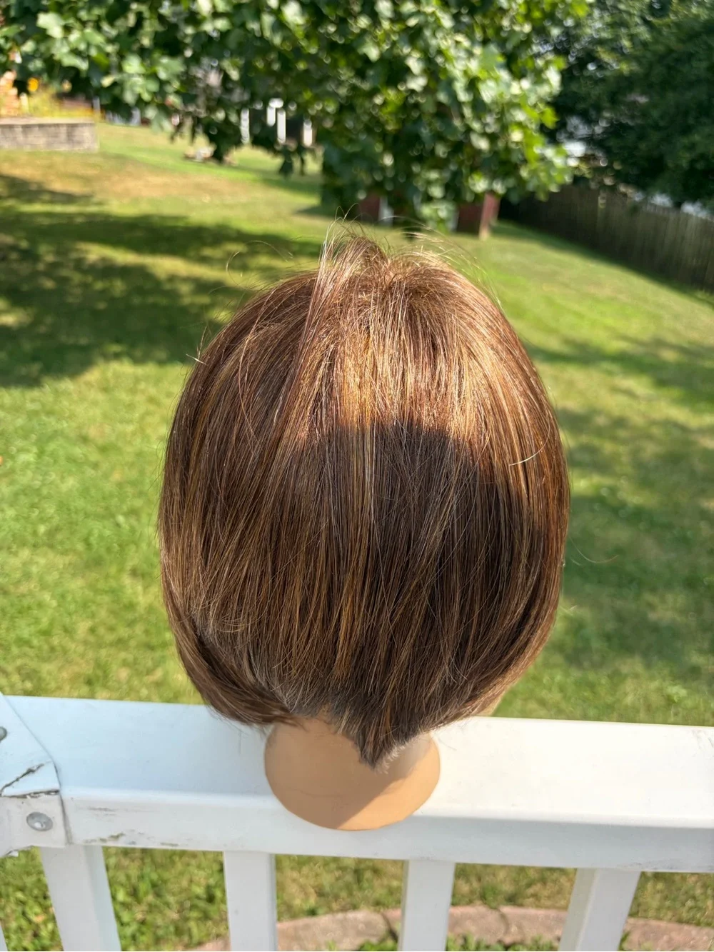 Bobbi Boss Midway brown with honey highlights angled straight Bob synthetic wig